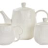 Juego de tres piezas de porcelana blanca y soporte para té o café. Vista de las tres piezas