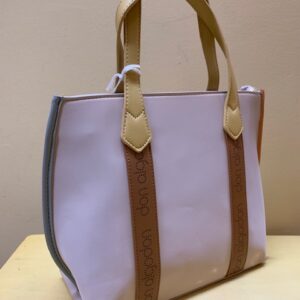 Bolso mano ultraligero charol marfíl y multicolor de Don Algodón. Vista lateral