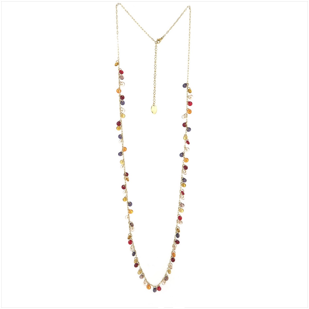 En acero inoxidable bañado en oro 18K, y resinas colores tierra